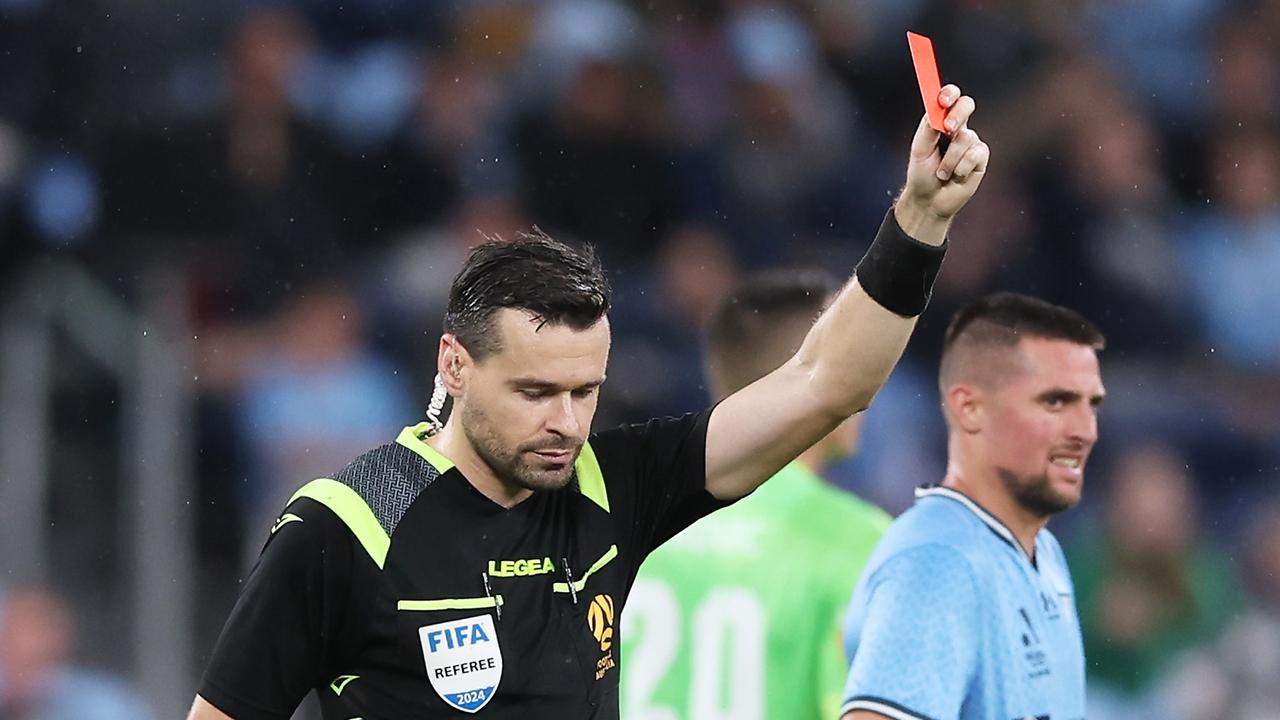 Referee Ben Abraham flashes a red card. Picture: Getty