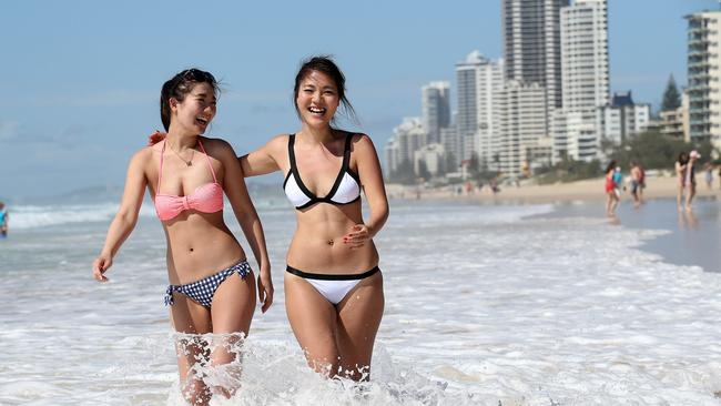 Japanese tourists including 24-year-olds Ikumi Shimane and Misaki Miyazaki from Tokyo led international visitor growth into the Gold Coast for the 12 months to March. Picture: Adam Head