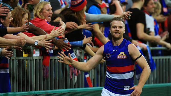 Jake Stringer celebrates with fans after the preliminary final win. Picture: Toby Zerna