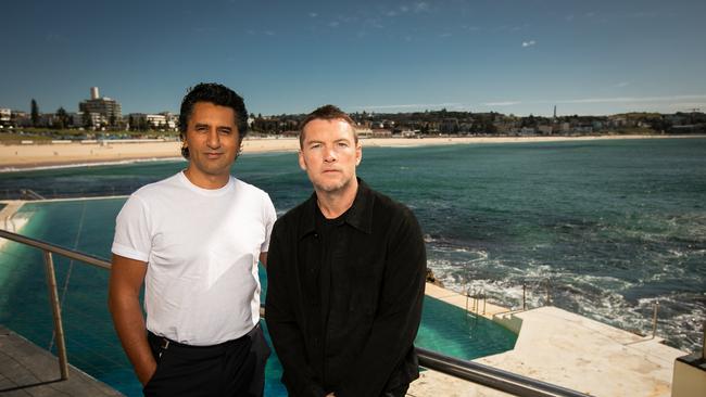 Avatar: The Way of Water actors Sam Worthington and Cliff Curtis on the balcony at Bondi Icebergs Club over looking Sydney's iconic Bondi Beach. Picture: The Daily Telegraph