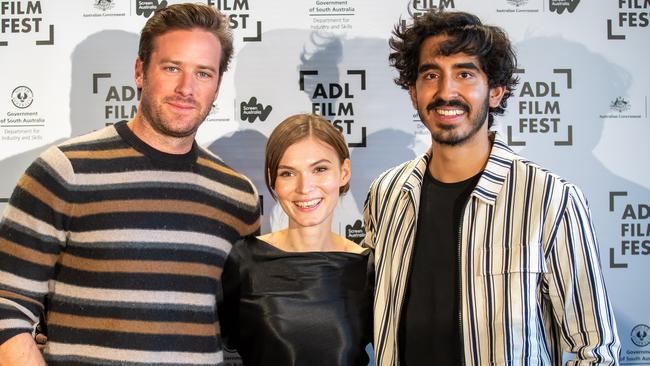 Armie Hammer, Tilda Cobham-Hervey and Dev Patel during a media call ahead of the Hotel Mumbai Australian Premiere in Adelaide in 2018. (Photo by James Elsby/Getty Images).