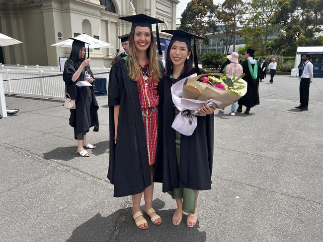 Sofia De Leon (Master of Educational Psychology) and Ayaka Mizudani (Master of Educational Psychology) at the University of Melbourne graduations held at the Royal Exhibition Building on Saturday, December 14, 2024. Picture: Jack Colantuono