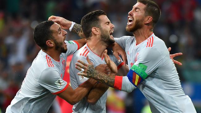 Spain celebrate Nacho’s impressive strike.