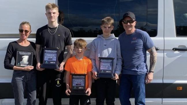 Tania Buckley, Jett Buckley, Cruz Kelly, Ayce Buckley and Marco Kelly at a Karting event. Picture: Instagram/Supplied