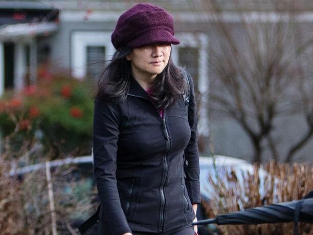 Meng Wanzhou, chief financial officer of Huawei Technologies Co., leaves her home while out on bail in Vancouver, British Columbia, Canada, on Thursday, Jan. 10, 2019. Canadians Michael Kovrig and Michael Spavor were each detained on Dec. 10 in China in the aftermath of Canada's arrest in Vancouver of Meng Wanzhou. Meng is out on bail, while Kovrig and Spavor remain in custody. Photographer: Ben Nelms/Bloomberg