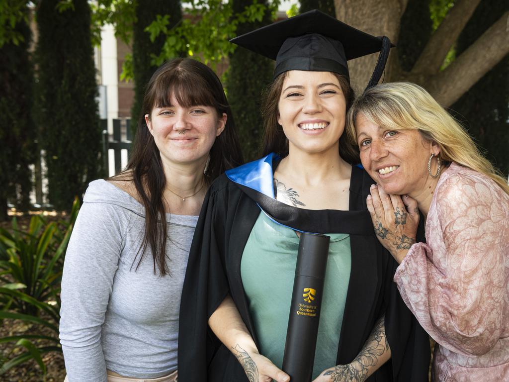 Bachelor of Nursing graduate Caitlin White with sister Sarah White and mum Helen White at a UniSQ graduation ceremony at The Empire, Tuesday, October 29, 2024. Picture: Kevin Farmer