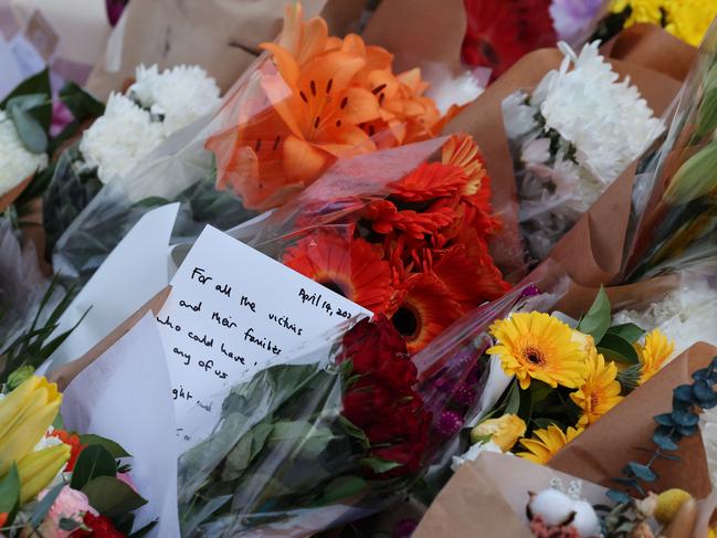 Flower tributes continue to grow at Bondi Junction on Monday morning. Picture: Rohan Kelly