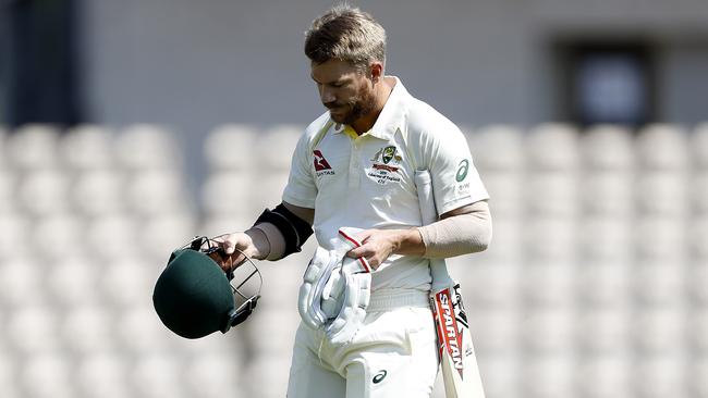 SOUTHAMPTON, ENGLAND — JULY 23: David Warner of Brad Haddin XII looks dejected after being dismissed by Michael Neser of Graeme Hick XII during day one of the Australian Cricket Team Ashes Tour match between Brad Haddin XII and Graeme Hick XII at The Ageas Bowl on July 23, 2019 in Southampton, England. (Photo by Ryan Pierse/Getty Images)