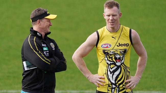 Richmond head coach Damien Hardwick with star Tiger Jack Riewoldt. Hardwick has said he is ready to go into a hub to restart the AFL season, but Riewoldt has some reservations. Picture: AAP