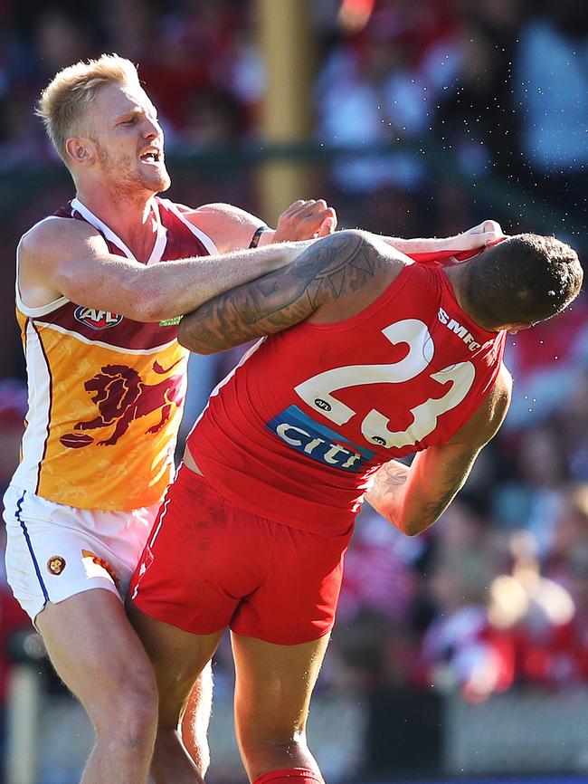 Nick Robertson and Lance Franklin come to blows. Picture: Phil Hillyard