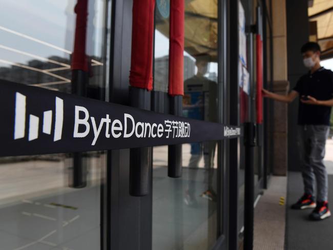 The ByteDance logo is seen at the entrance to a ByteDance office in Beijing on July 8, 2020. - Video sharing app TikTok, which is owned by Chinese company ByteDance, announced on July 6 it was pulling out of Hong Kong, less than a week after a new national security law went into effect. (Photo by GREG BAKER / AFP)