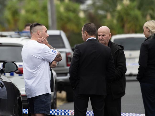 Detectives talk with Mr Latorre’s family. Picture: Nicki Connolly