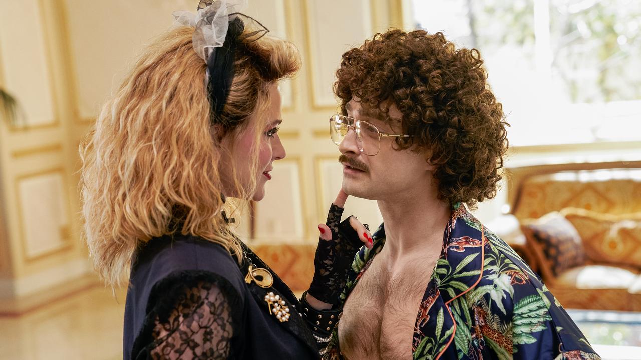 Evan Rachel Wood as Madonna and Daniel Radcliffe as Weird Al Yankovic in a scene from Weird: The Al Yankovic Story.