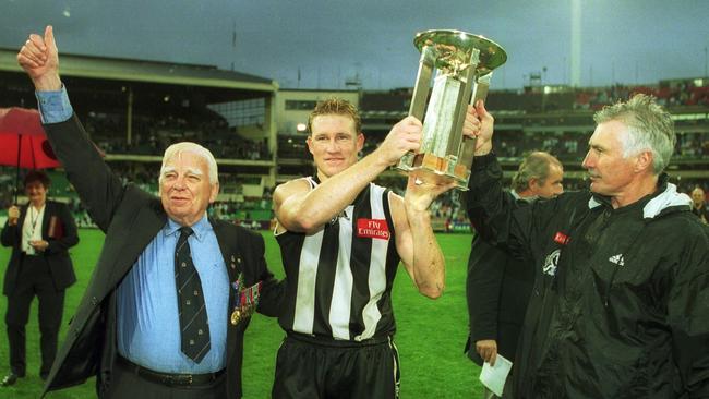 Mick Malthouse and Nathan Buckley celebrate an Anzac Day win in 2002.