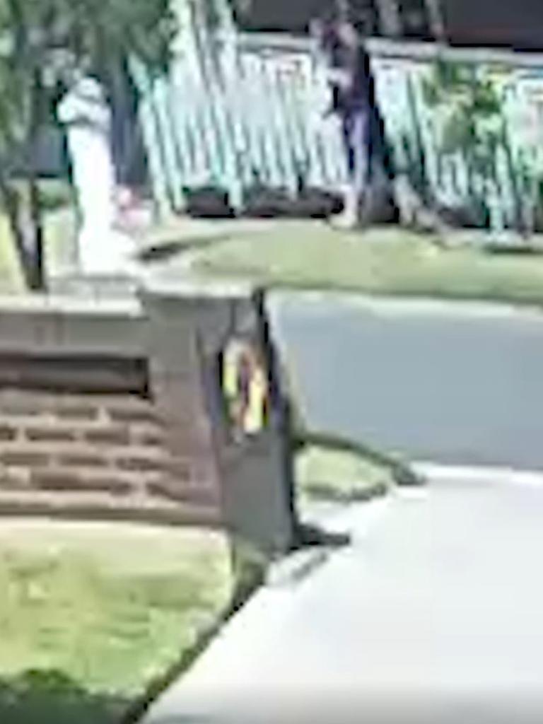 CCTV captured about 20 minutes later shows that man walking with another person along Bowood Ave, Bexley, where police allege the second getaway car was parked. Picture: NSW Police