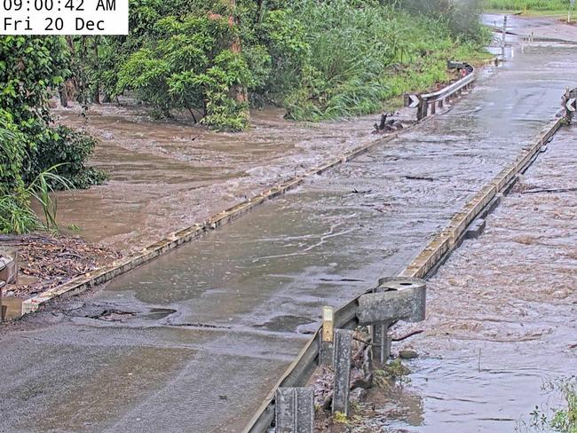 Roads are flooding across the Whitsundays, including the Bruce Highway at Lethebrook, with some motorists ignoring warnings and driving into floodwaters.