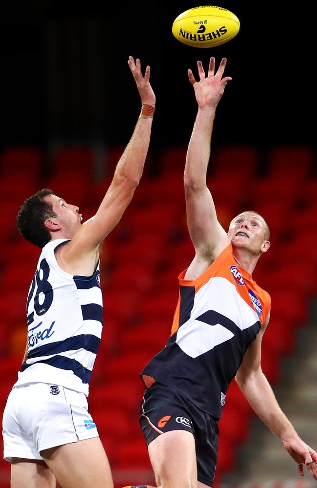 Giants recruit Sam Jacobs battles with Geelong’s Darcy Fort during Round 1 of the now suspended 2020 AFL season. Picture: Cameron Spencer/Getty Images