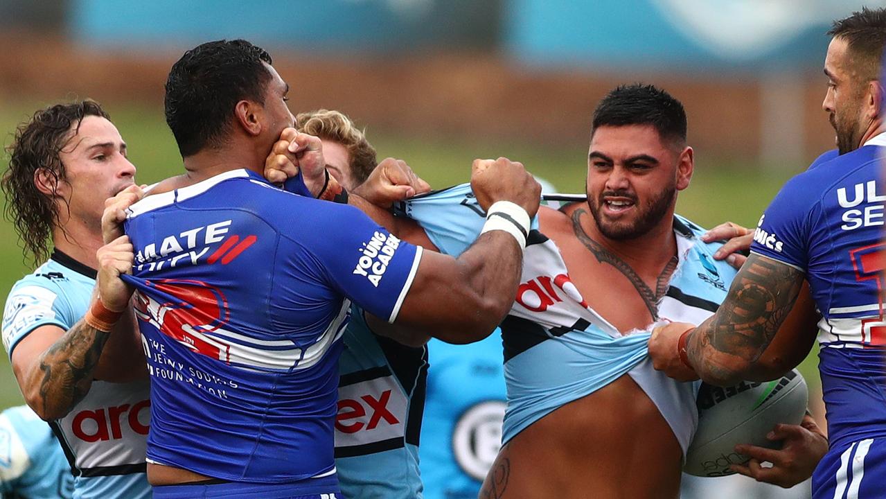 NRL strongmen Royce Hunt and Tevita Pangai Jr Junior scuffle during a February trial. Photo by Mark Metcalfe/Getty Images