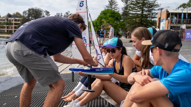 Up-and-coming sailors in the SailGP Inspire program play with remote control boats ahead of Sydney SailGP, Event 1 Season 2 in Sydney Harbour, Sydney, Australia. 27 February 2020. Photo: Thomas Lovelock for SailGP.