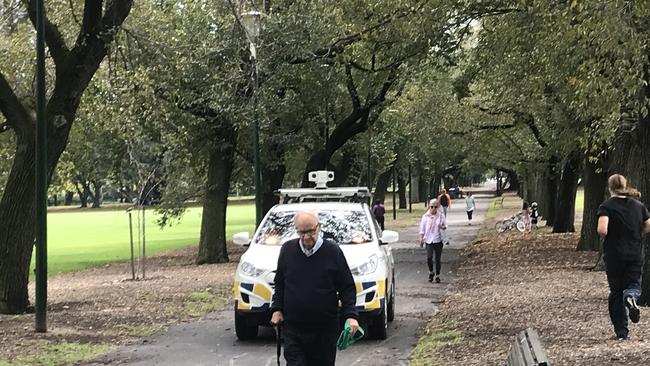 Security patrols monitor social distancing in Fawkner Park near The Alfred hospital in Melbourne. Picture: Rachel Baxendale