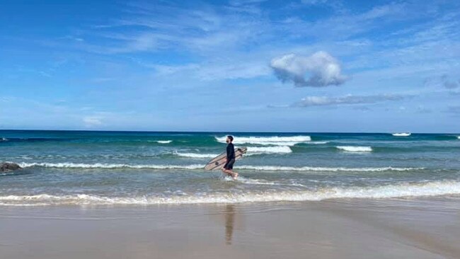 Liam Hemsworth was spotted by locals surfing at Double Island Point at the weekend. Picture: Facebook/ Shelley Treloar