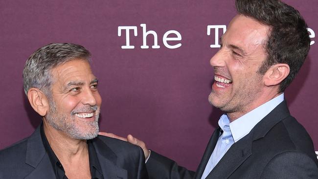 George Clooney (L) and Ben Affleck arrive for The Tender Bar premiere at the Directors Guild of America Theatre in Los Angeles, California. Picture: AFP