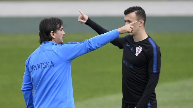 Croatia coach Zlatko Dalic (left) speaks to star forward Ivan Perisic during a training session at the Roschino Arena ahead of the World Cup final. Photo: AFP