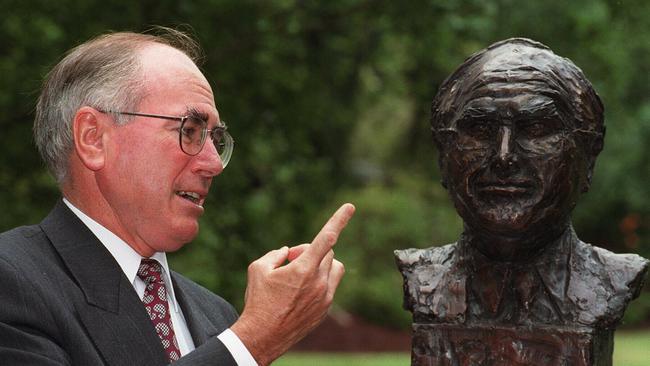 Former prime minister Minister John Howard with the bronze bust statue of himself in Ballarat.