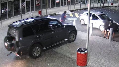 A CCTV image shows the Pajero being used to reverse through the doors of one of the stores targeted.