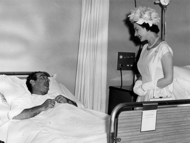 Queen Elizabeth II with hospital patient A Petriono at the Queen Elizabeth Hospital in 1963.