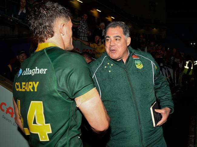 Kangaroos coach Mal Meninga talks with Nathan Cleary after the match against Scotland.