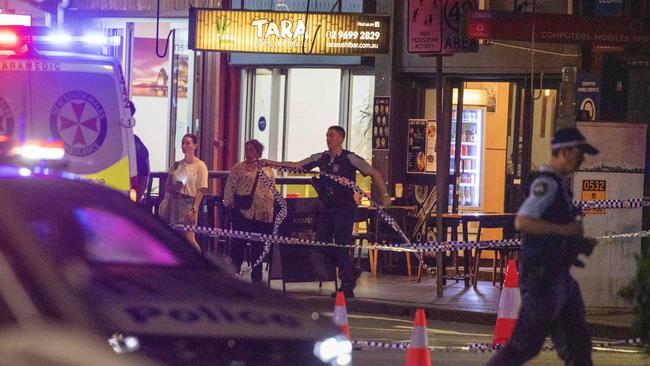 Police cordoned off Cleveland Street late into the night. Picture: Liam Mendes