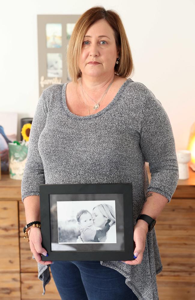 Mia Bannister with a pictures of her late son Oliver Hughes. Picture: Liam Kidston