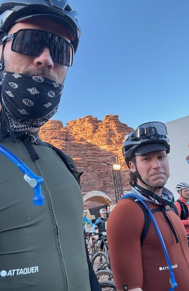 Max Gawn and Ed Langdon cycling in Saudi Arabia.