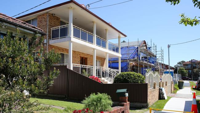 Australian Federal Police are at the home of an unassuming 32-year-old karaoke-loving technical dynamo. Picture: NewsWire / Gaye Gerard