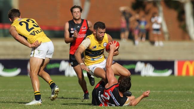 A rare moment when Jimmy Toumpas and the Eagles got on top of Aaron Anderson’s West Adelaide. Picture: Dean Martin