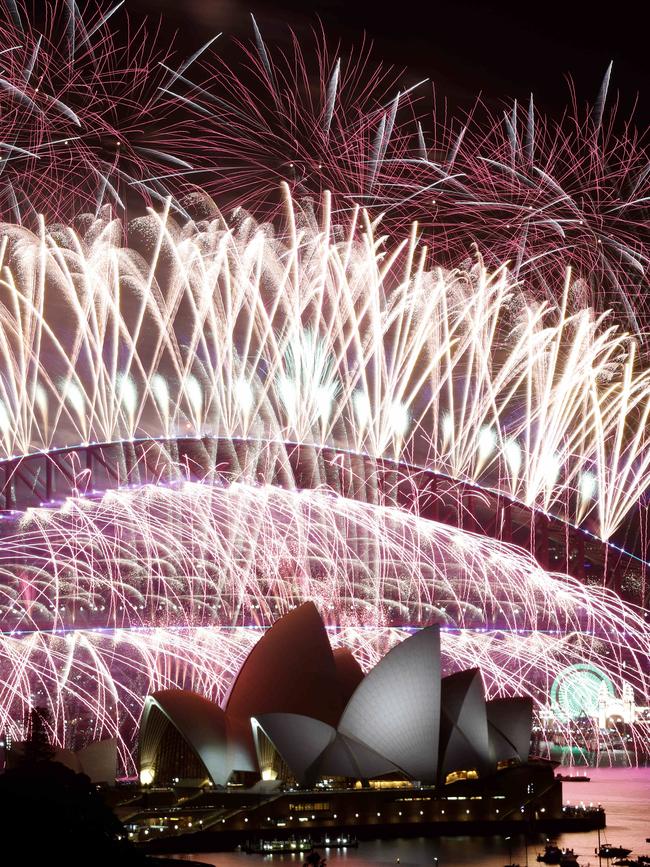 Sydney New Year's Eve midnight fireworks over Sydney Harbour. Picture: Jonathan Ng