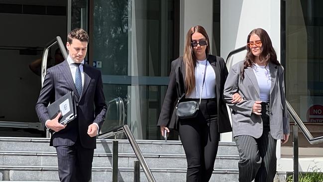 Chelsea Hubbard (right) and Georgia Hubbard leaving Wollongong Courthouse with their lawyer Matt Ward. Picture: Dylan Arvela