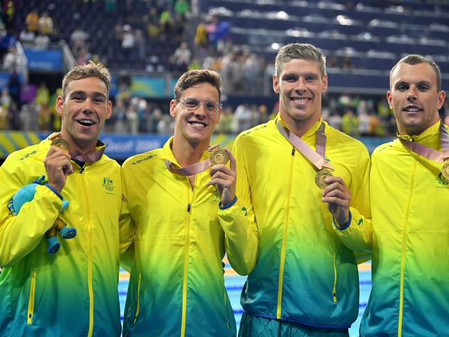 GOLD COAST, AUSTRALIA - APRIL 10:  Gold medalists Mitch Larkin, Jake Packard, Grant Irvine and Kyle Chalmers of Australia pose during the medal ceremony for the Men's 4 x 100m Medley Relay Final on day six of the Gold Coast 2018 Commonwealth Games at Optus Aquatic Centre on April 10, 2018 on the Gold Coast, Australia.  (Photo by Dan Mullan/Getty Images)