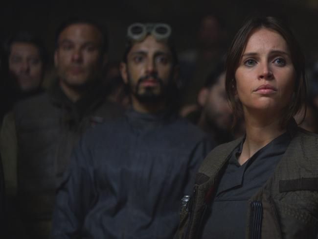 New faces in Rogue One: A Star Wars Story include Jyn Erso (played by Felicity Jones) in foreground and Bodhi Rook (Riz Ahmed) in the background at left. Picture: Lucasfilm Entertainment