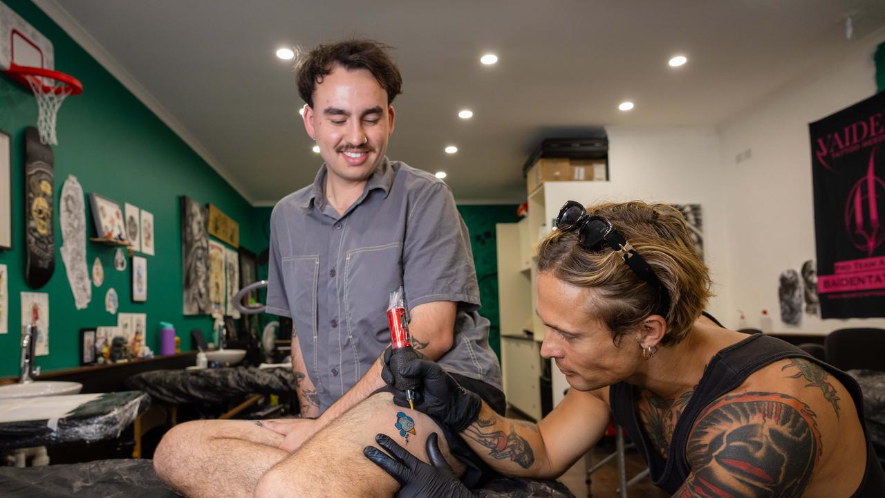 Journalist Mitch Clarke and tattooist Josh Green. Picture: Jason Edwards