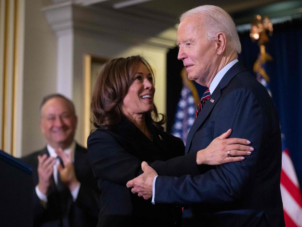 Vice President Harris embraced President Joe Biden during the Democratic National Committee's Holiday Reception in Washington, DC on December 15. Harris crucially decided against distancing herself from Biden’s presidency during her campaign. Picture: Saul Loeb/AFP