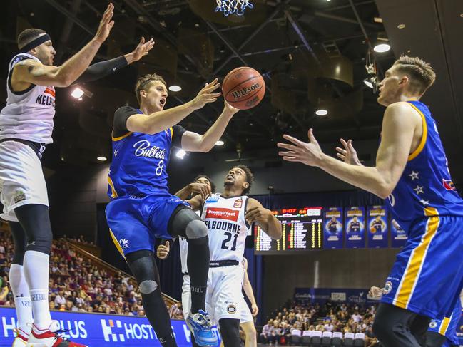 Bullets star Cameron Bairstow passes under the basket on Saturday. Picture: AAP