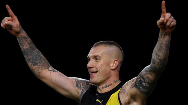 Dustin Martin of the Tigers celebrates his goal in the fourth quarter. Pic: Michael Klein