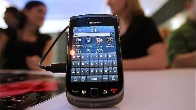 The BlackBerry Torch 9800 is fun to play with but what are the side-effects? / AFP