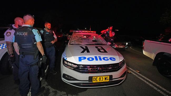 One of the 104 police cars damaged in the riot. Picture: Michelle Haywood