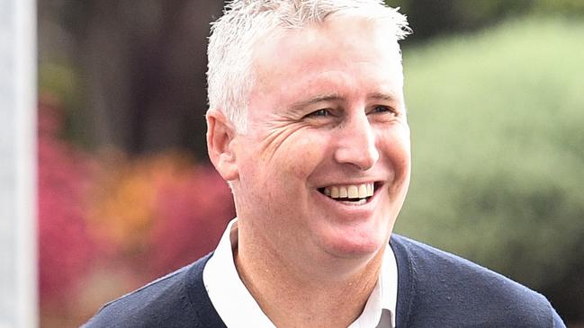 New Socceroo Head Coach Bert Van Marwijk (right) is meet by FFA head of national performance Luke Casserly as he arrives at Sydney's International Airport in Sydney, Thursday, February 1, 2018. (AAP Image/Brendan Esposito) NO ARCHIVING