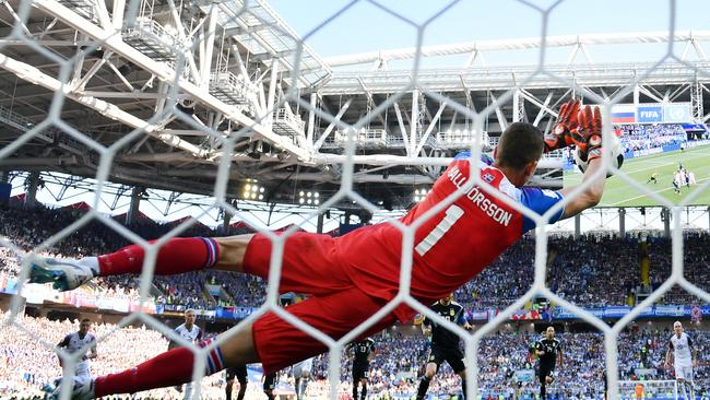 Hannes Halldorsson pushes aside Lionel Messi’s penalty. Picture: Getty.