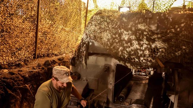 A Ukrainian gunners lets rip with a 155mm M-109 Paladin howitzer towards a Russian position on the front line near Chasiv Yar, Donetsk region. Picture: AFP