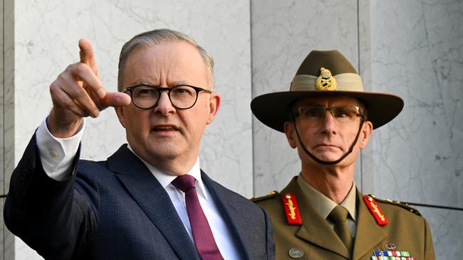 Anthony Albanese and Angus Campbell speak to the media duing a press conference after the release of the Defence Strategic Review at Parliament House.